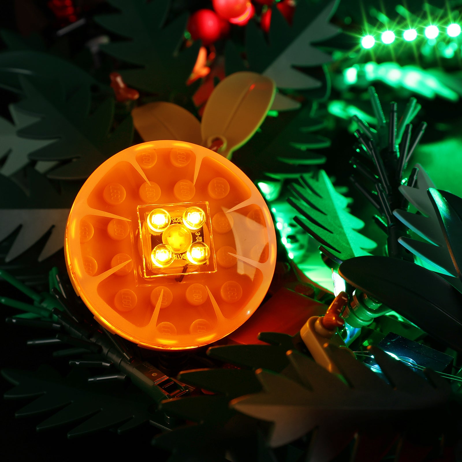 Close-up LED installation on LEGO Christmas Wreath 10340