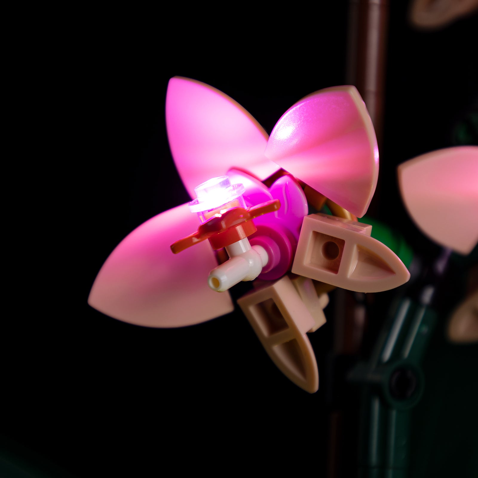 Kyglaring LED light detail on LEGO Orchid 10343 - macro shot