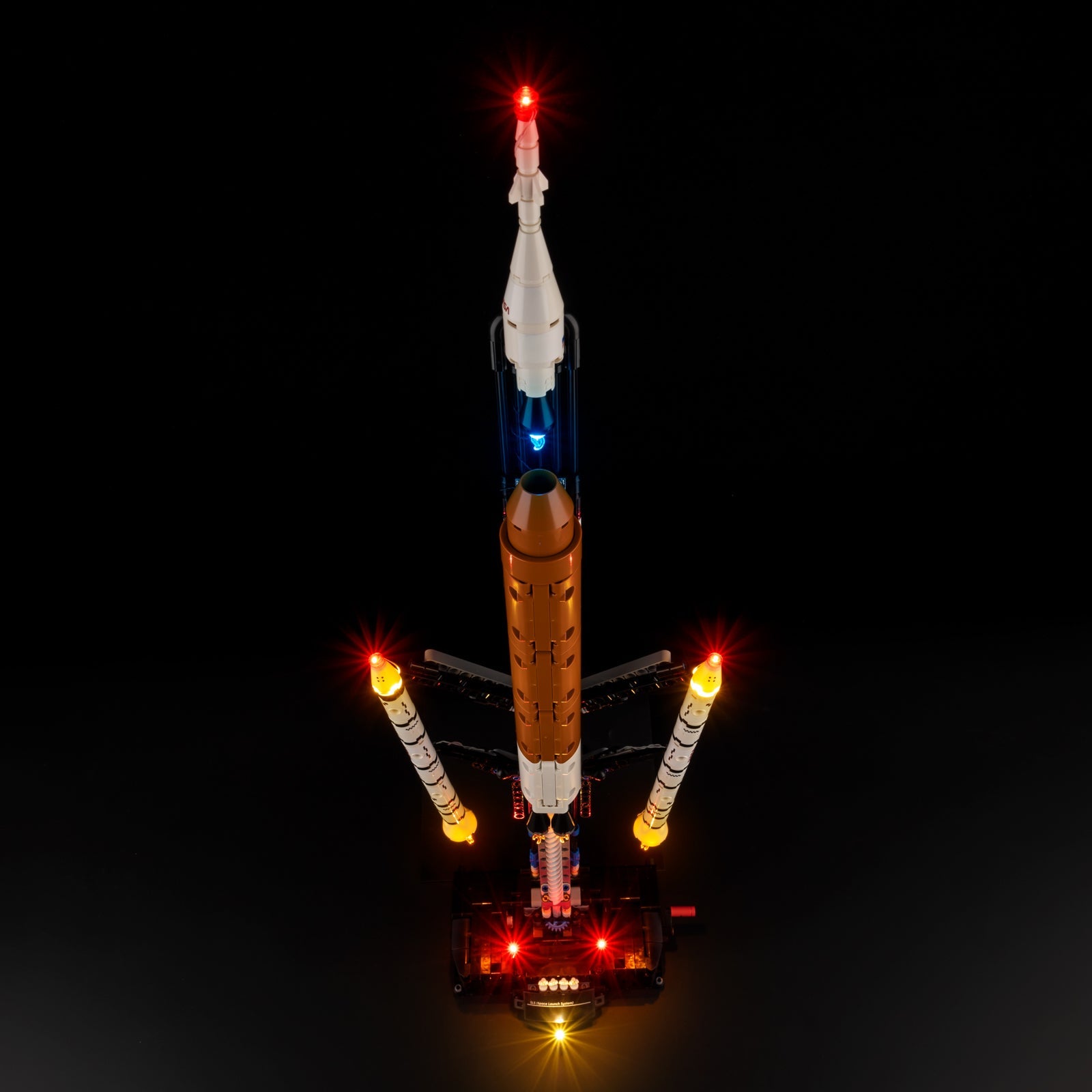 Light Kit for LEGO NASA Artemis Space Launch System Rocket 42221 - base close-up with four astronaut minifigures and SLS nameplate