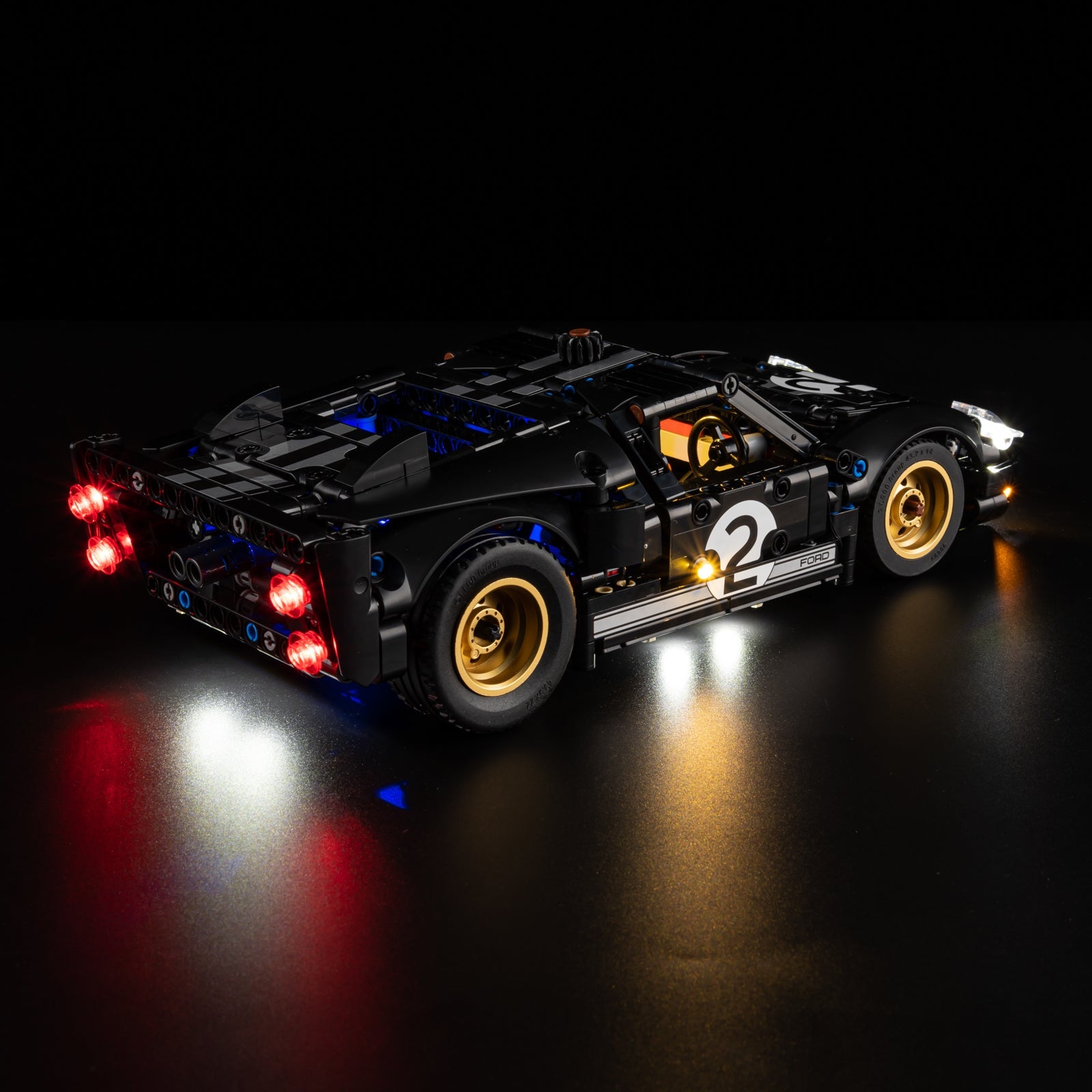 Light Kit for LEGO 1966 Ford GT40 MKII Race Car 42223 - front close-up with piercing headlights and gold wheel detail