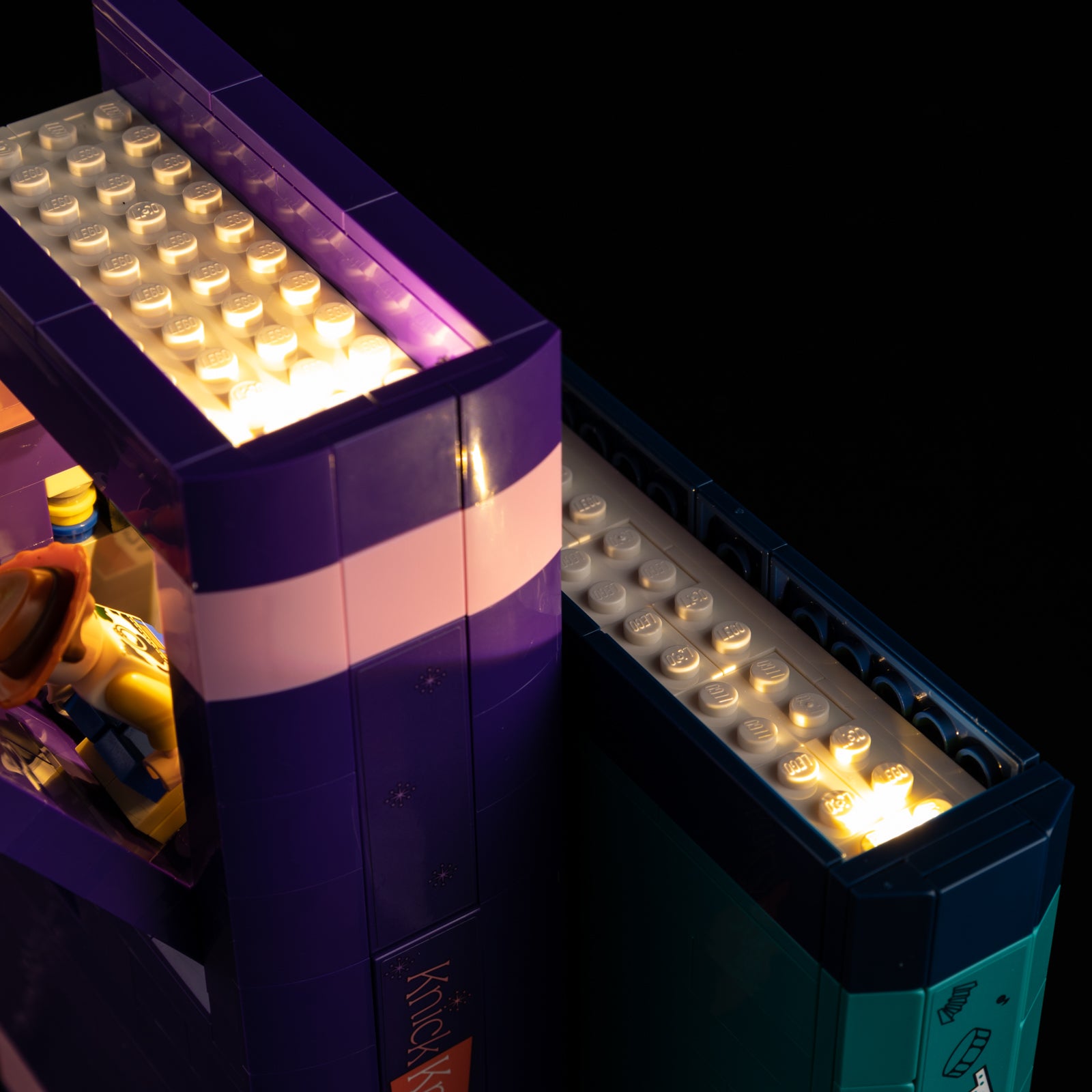 Close-up of LEGO 43301 Above the book