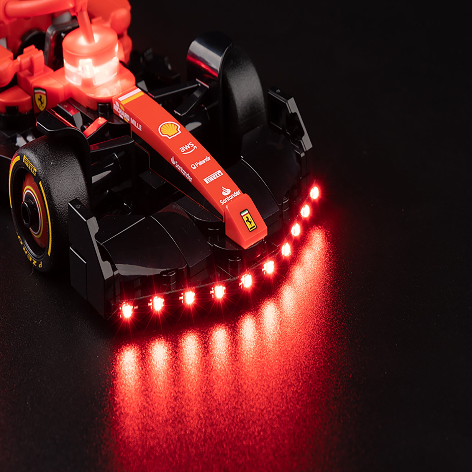 77242 77242 - close-up of headlight and front detail