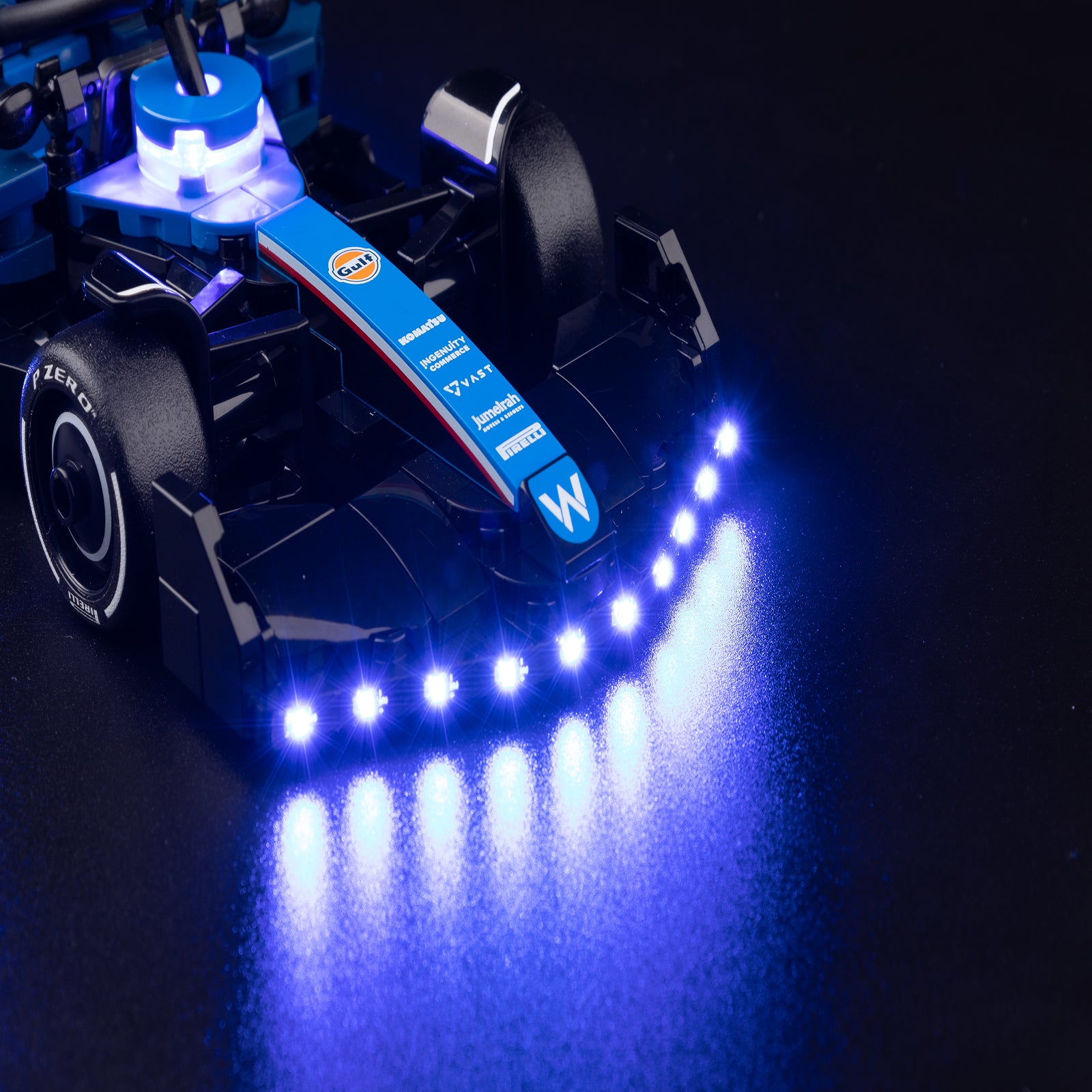 77249 77249 - close-up of headlight and front detail